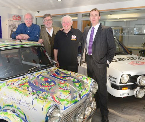 (L-R) Artist Neil Shawcross, Dermott Simpson, CEO of Northern Ireland Plastics, Paddy Hopkirk and John Mulholland, CEO of John Mulholland Motors, with the Shawcross Art Mini, which is autographed by Paddy and is to be auctioned at the upcoming Paddy Hopkirk Gala event at Titanic Belfast on the 22nd of February. The proceeds will go to the Integrated Education Fund for Northern Ireland and the SKIDZ charity. The Paddy Hopkirk Gala has been organised to celebrate the 50th anniversary of Paddy's legendary victory on the gruelling Monte Carlo Rally, and will be attended by such luminaries as Ari Vatanen, Jimmy McRae, Kris Meeke, Rosemary Smith and many others. The event will kick off with a Mini cavalcade from Stormont to Titanic Belfast, followed by an autograph session and autotest display. That evening will see the gala dinner take place to pay tribute to Paddy. Photo by Esler Crawford.