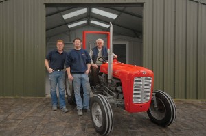 Father and son team: (l-r) General Manager Darren, Production Manager Thomas and founder and MD Sean on his 4-cylinder diesel MF35.