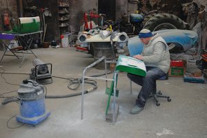Jack is seen here working on the JD wings, with the bonnet for the Jag and Spitfire in the background; note the Roadless.