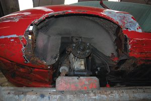 This is the rear wheel arch of a Jaguar that is currently on the lift; there is a lot of fabrication to be done here.